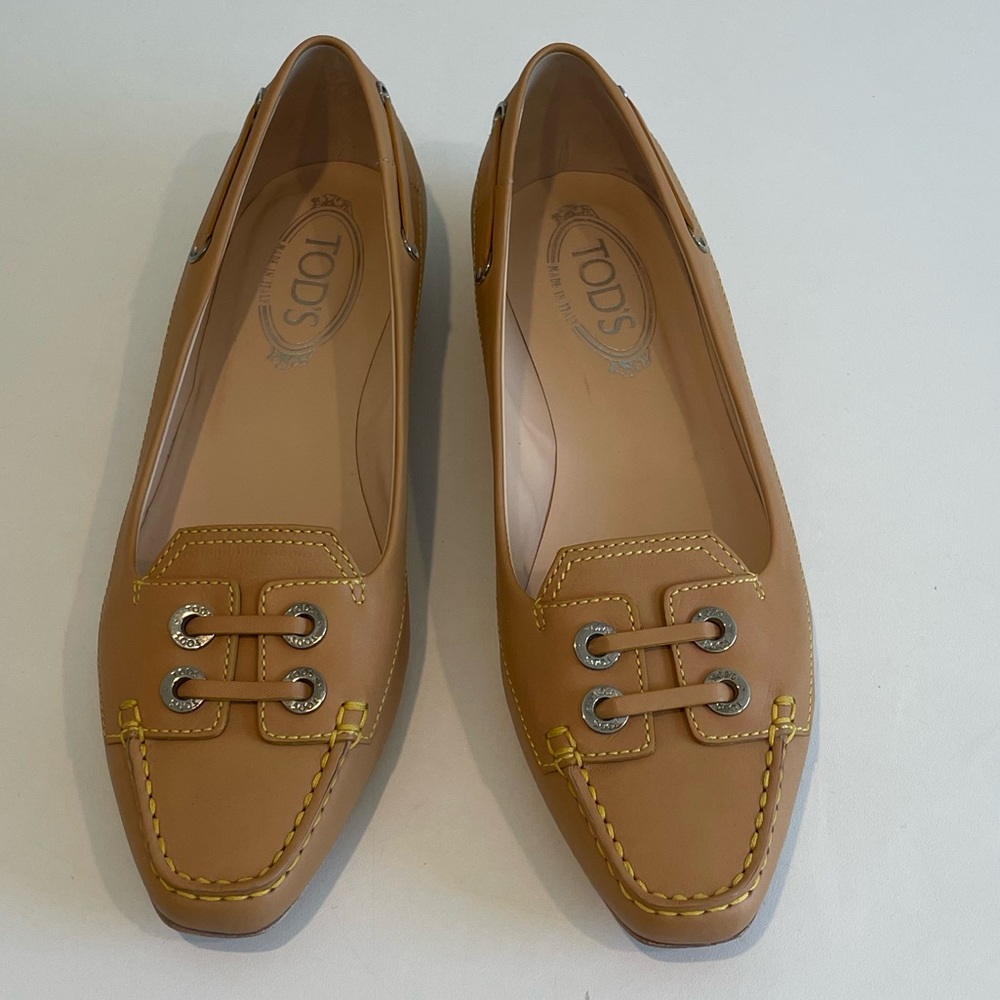 Tod’s tan leather loafers